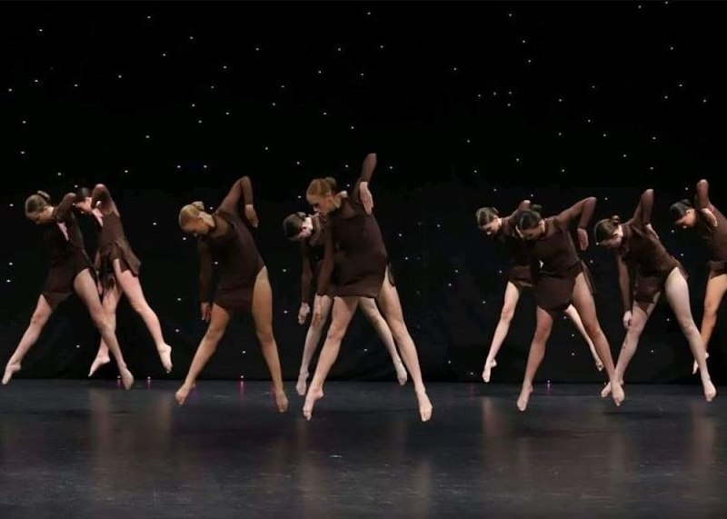 Stage Door Academy contemporary dancers performing on stage.