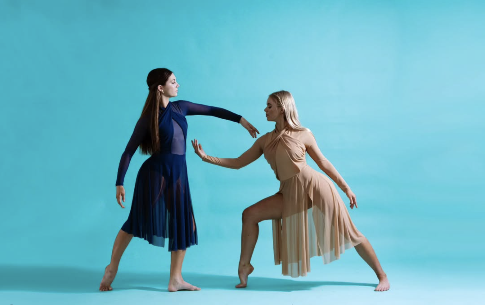 Stage Door Academy contemporary lyrical dancers posed in a studio duet.